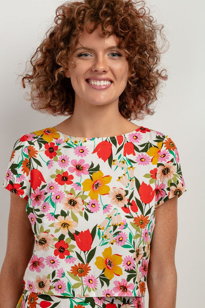 Model wearing Tessita T408 Viscose Patterned Blouse - demonstrating effortless elegance paired with chic summer accessories for a stylish look.