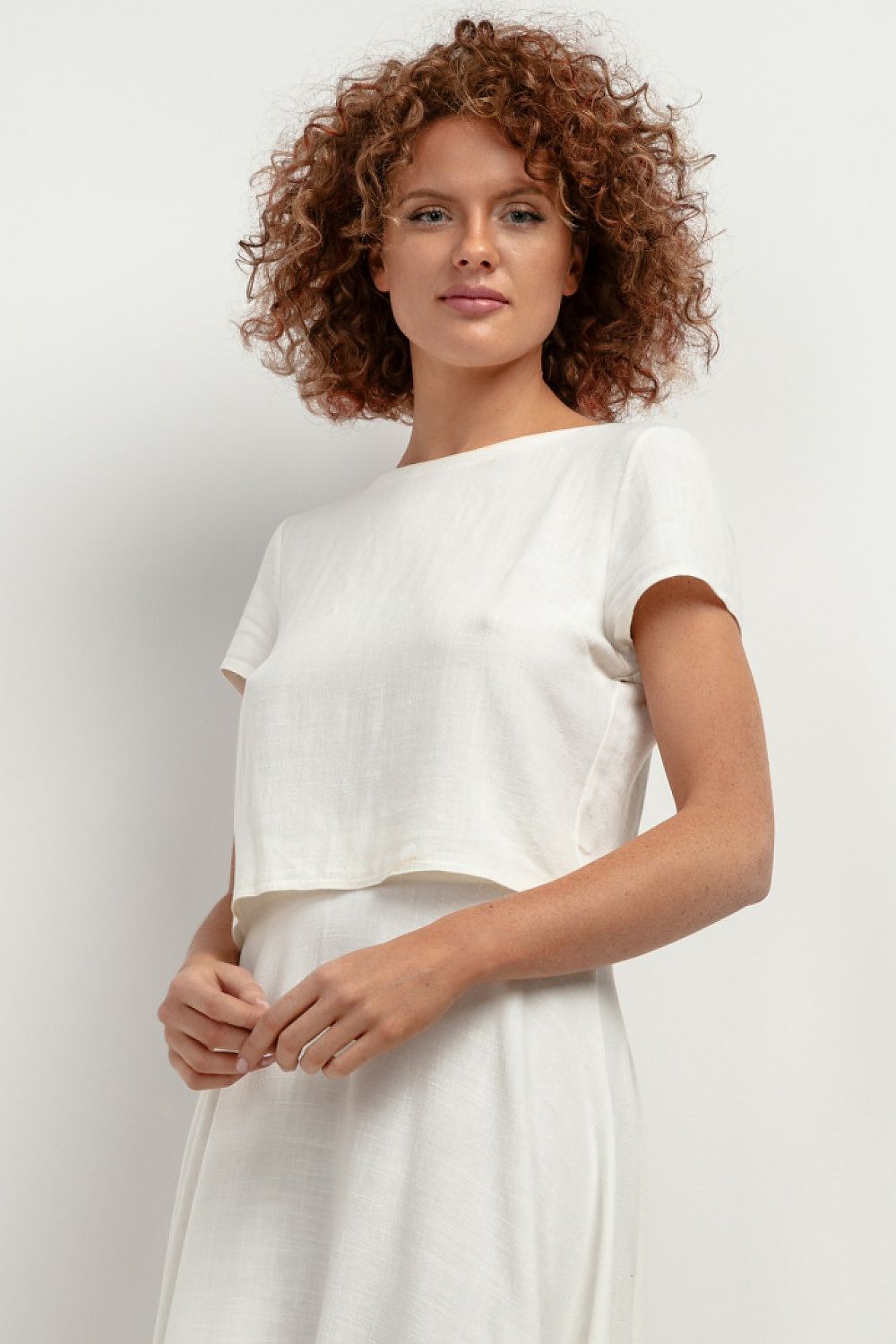 Chic Tessita T401 linen blouse showcased in various colours, highlighting its fashionable cut and versatility for summer styling, ideal for heat and comfort.