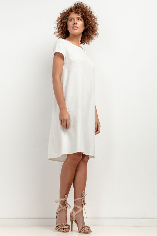 Elegant Tessita T403 linen dress hanging elegantly, featuring airy design and comfortable fit, ideal for summer outings.