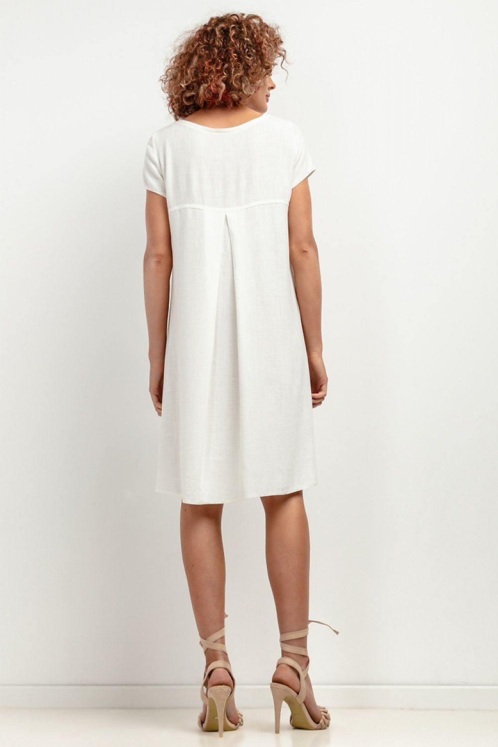 Elegant T403 Linen Dress by Tessita, showcasing a loose and lightweight design, perfect for summer occasions.