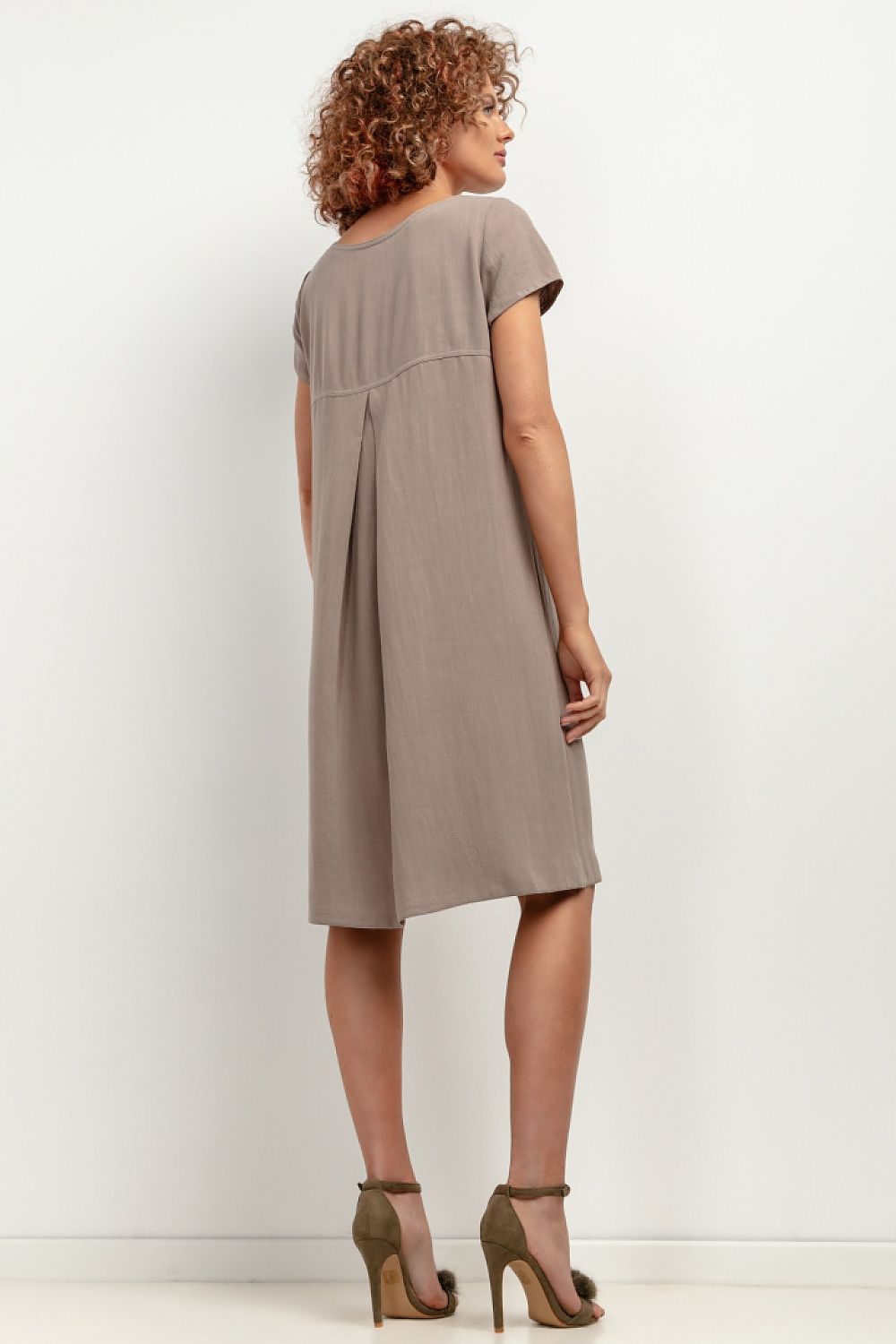 Versatile T403 Linen Dress by Tessita, ideal for casual outings, demonstrating effortless elegance and comfort.
