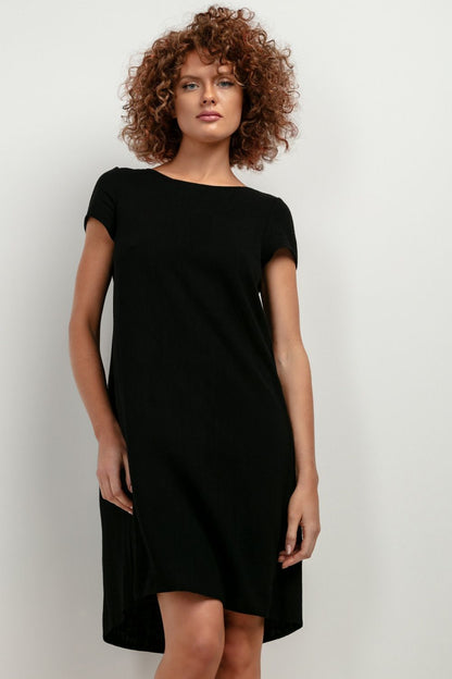 Side view of the T403 dress by Tessita, featuring a stylish counterfold design, ideal for casual summer outings.