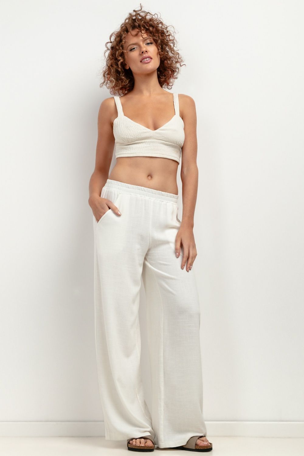 High-quality T404 linen pants from Tessita, ideal for women seeking fashionable comfort, with a chic wide-leg cut suitable for both casual outings and formal occasions.