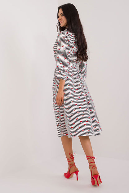 Back view of the Elegant Midi Shirt Dress by Lakerta, emphasizing the classy collar and neatly finished details that enhance feminine elegance.