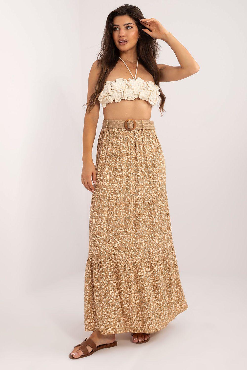 Elegantly styled Italy Moda Floral Print Maxi Skirt featuring a delicate ruffle hem and a chic buckled belt, perfect for sophisticated casual wear.