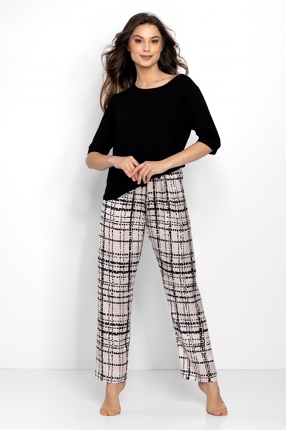 Luxury elegant women's satin and viscose pajamas by Momenti Per Me, featuring an oversize blouse and long elastic waistband pants, perfect for stylish sleepwear.