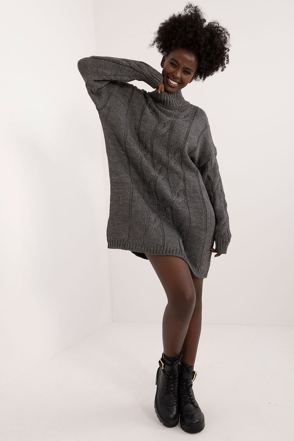 Elegant turtleneck dress from Badu showcasing a soft mixed wool and acrylic blend, perfect for everyday glamour.