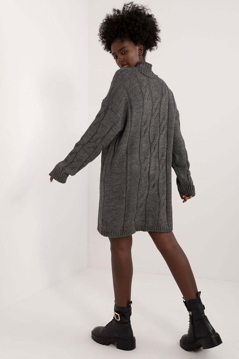 The luxurious Badu turtleneck dress with long sleeves, ideal for cooler days, blending comfort and style effortlessly.