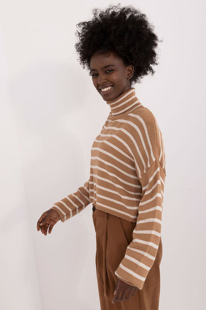 Close-up of Badu's luxury striped turtleneck sweater for women, highlighting the rich texture of soft acrylic and wool blend fabric.