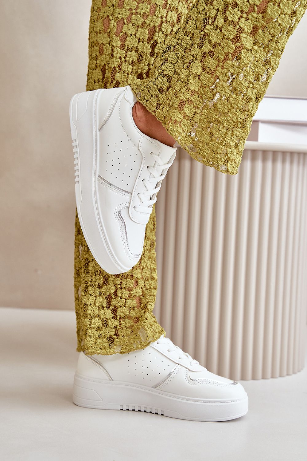 Luxury women's eco leather sneakers designed by Step in Style, featuring a modern 3.5cm platform and unique decorative lacing for a sophisticated touch.