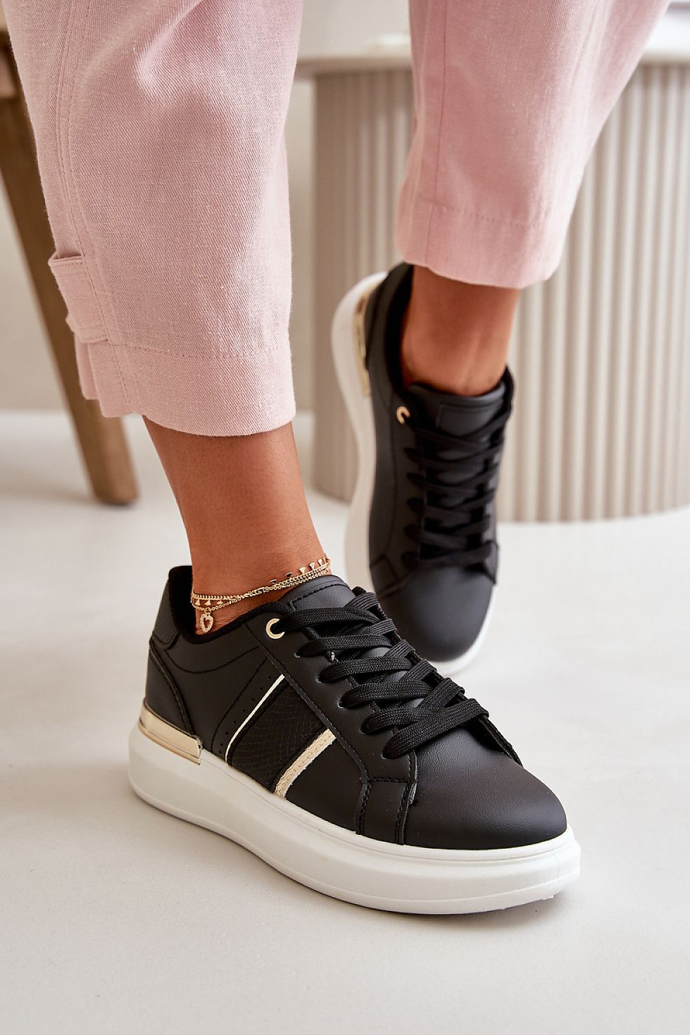 Elegant women's fashionable platform sneakers crafted from eco leather by Step in Style, featuring a chic mirrored element for a trendy look.