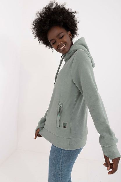 Elegant Women's Sublevel Insulated Hoodie showcasing premium insulation and a chic silhouette, perfect for casual yet refined outfits.