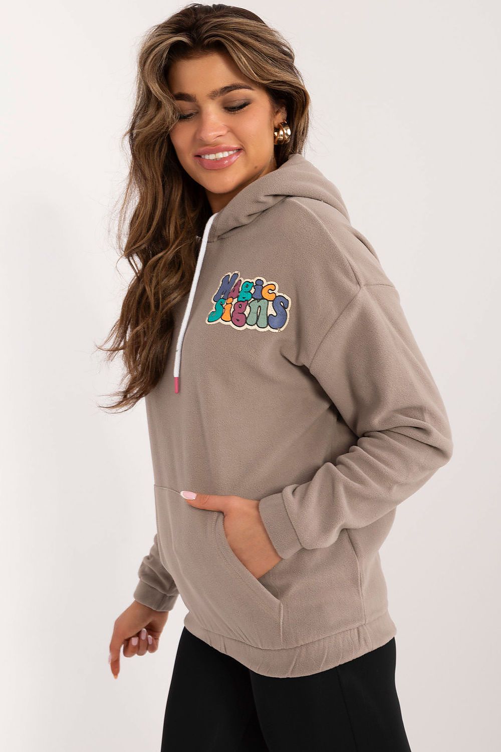 Stylish casual polyester sweatshirt from Sublevel with long sleeves and adjustable hood, designed for comfort and elegance during cooler days.