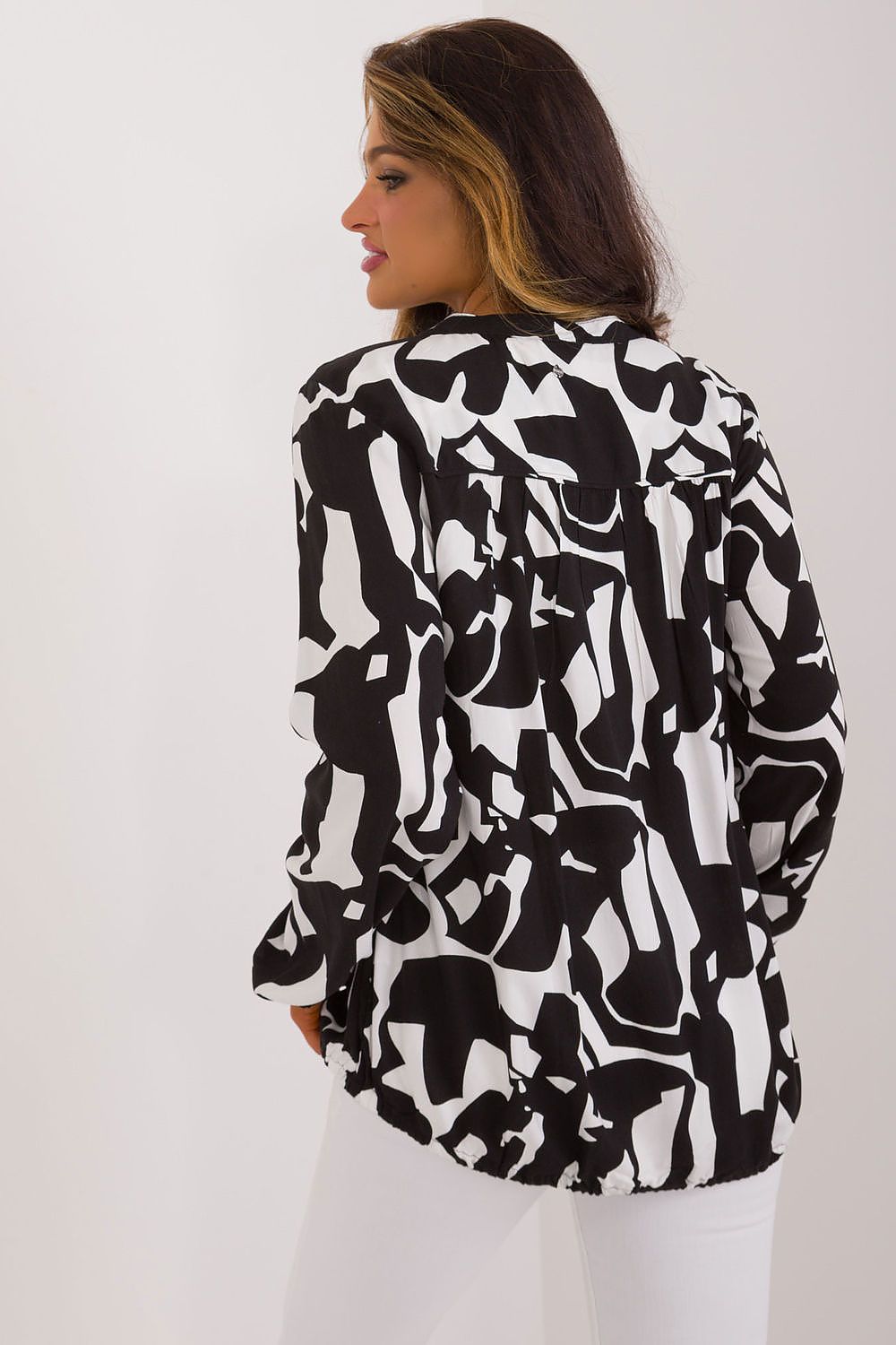 Close-up of the elegant viscose blouse for women by Sublevel, showcasing the intricate printed pattern and comfortable texture.