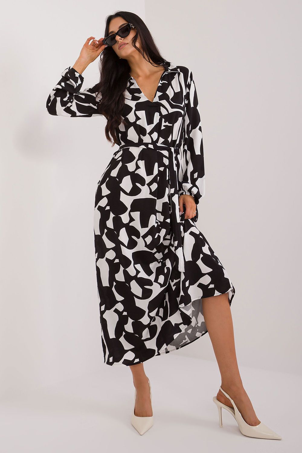 Model wearing the eco-friendly maxi shirt dress by Sublevel, highlighting its flattering silhouette and luxurious style, perfect for various occasions.