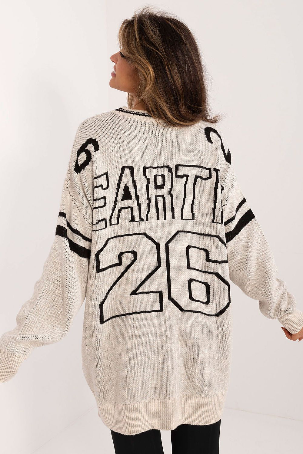 Luxurious chic long women's sweater by Badu, crafted in a premium acrylic-wool blend with an elegant print, showcasing a stylish casual look.