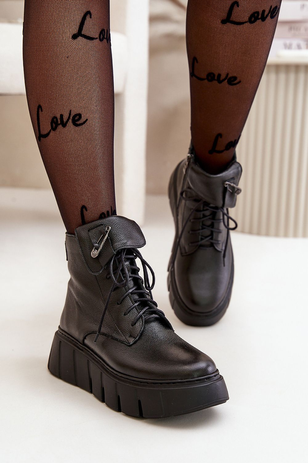Stylish women's buskin boots in natural leather, featuring lace-up and zipper detail, by Step in Style, perfect for a luxurious look on cooler days.