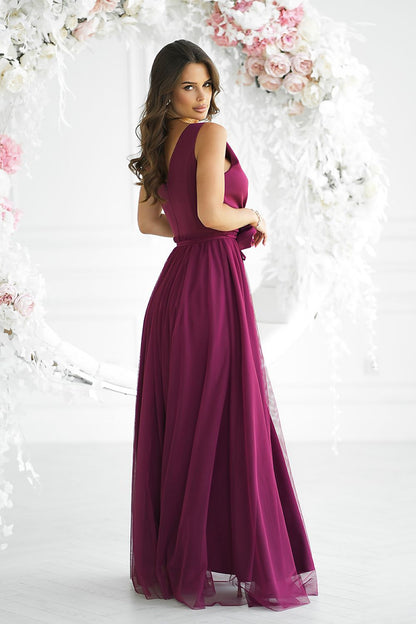 Bicotone's luxurious long dress with a delicate neckline, showcasing exquisite craftsmanship.