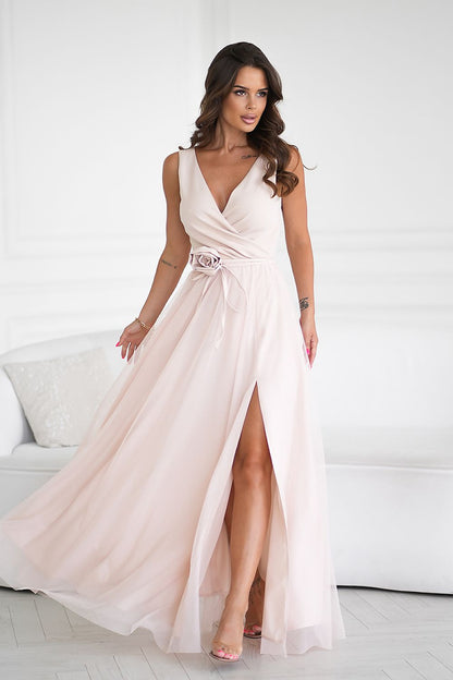 Chic double-layered long dress by Bicotone, beautifully complemented by a versatile rose belt.
