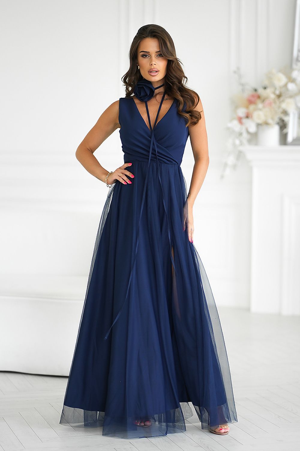 Bicotone's exquisite long dress with stylish slit and double-layered design, perfect for adding glamour to your wardrobe.