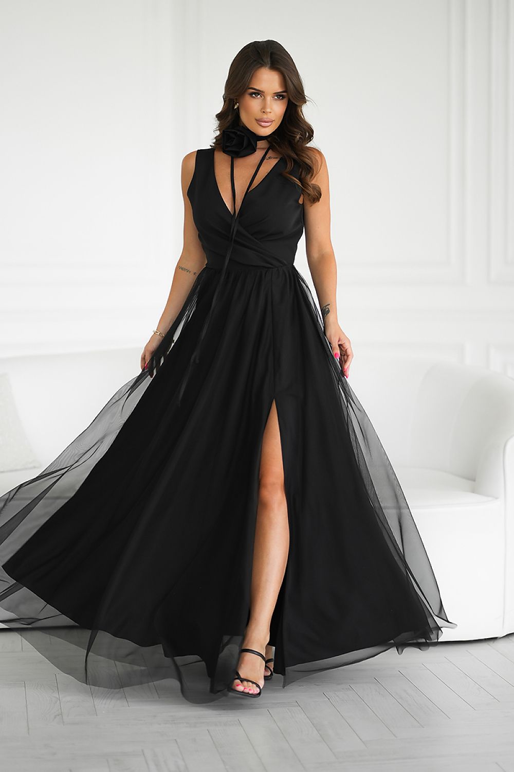 Bicotone long dress beautifully draping on a mannequin, accentuating the flattering silhouette and luxury tailored details, ideal for upscale events.