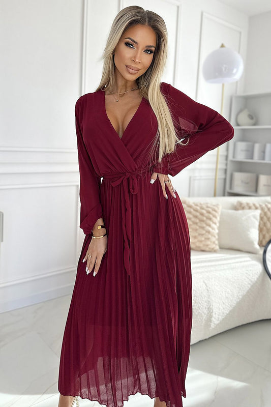 Luxurious Numoco burgundy pleated chiffon cocktail dress featuring a wrap neckline and long sleeves, perfect for elegant occasions.