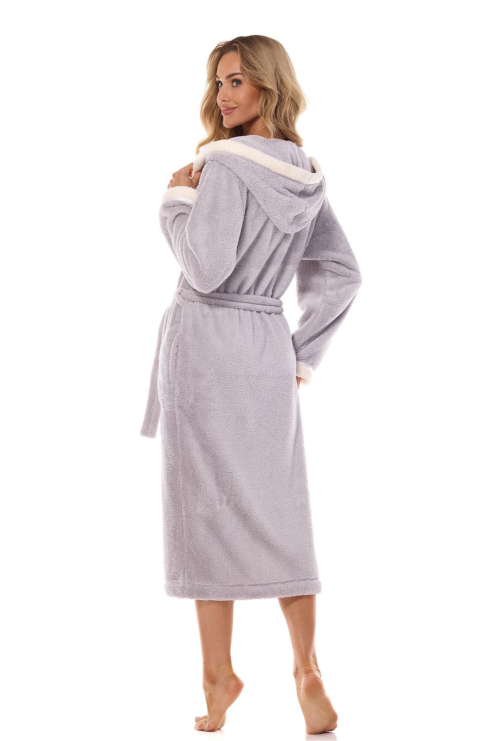 Model wearing L&L Collection luxurious hooded bathrobe, featuring belt tie and long sleeves, epitomising elegance for everyday use.