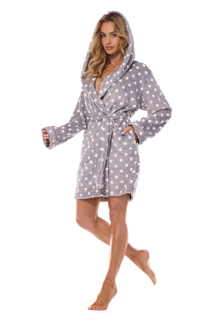 Luxurious women's knee-length bathrobe with charming polka dot print, featuring a hood and cuffs, by L&L collection.