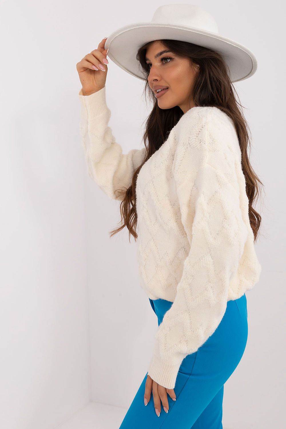 Elegant women's casual sweater by AT, featuring a textured weave, round neckline, and long sleeves for a luxurious everyday look.