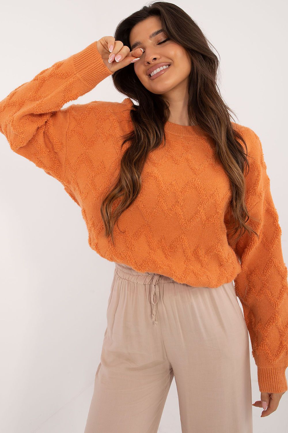 Long sleeve, comfortably fitting women's causal sweater by AT, ideal for both work and leisure.