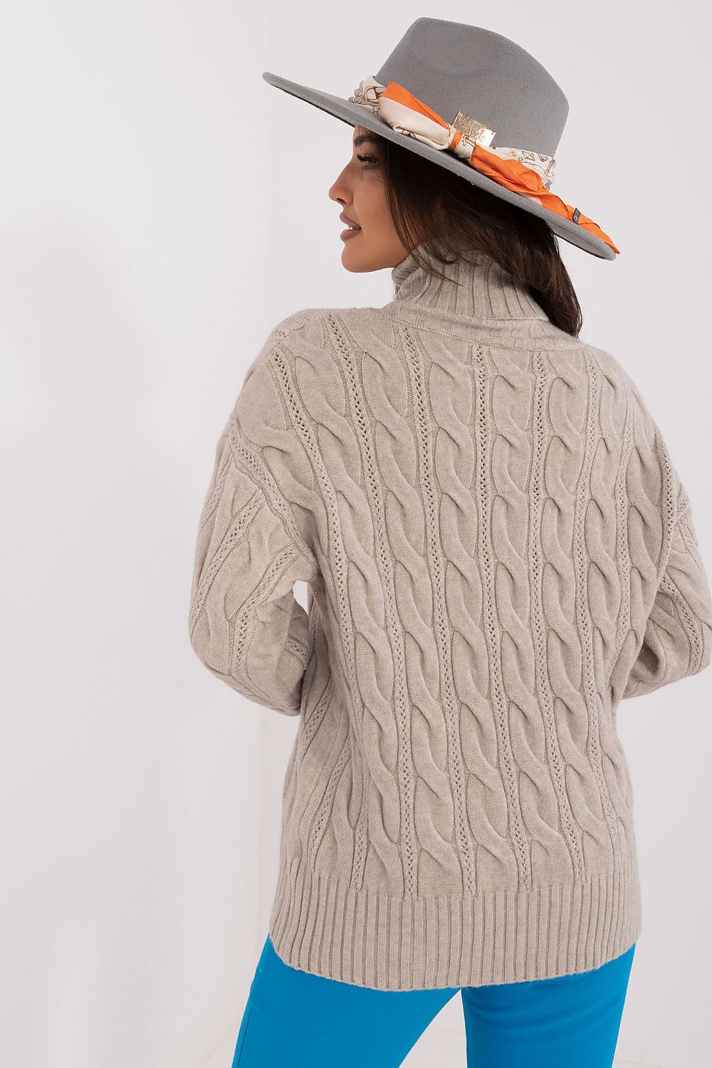 Chic long sleeve turtleneck sweater by AT, featuring rich textures and a comfortable fit for everyday luxury.