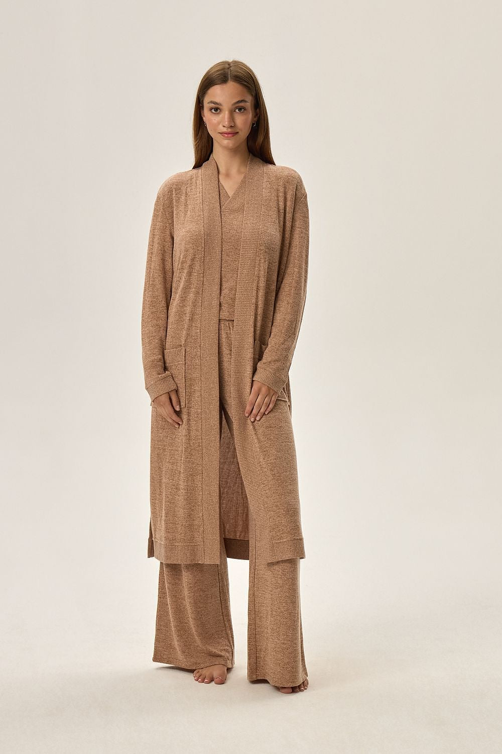 Luxurious Henderson Fudge Long Knit Bathrobe in soft beige with roomy pockets, perfect for comfort during colder days.