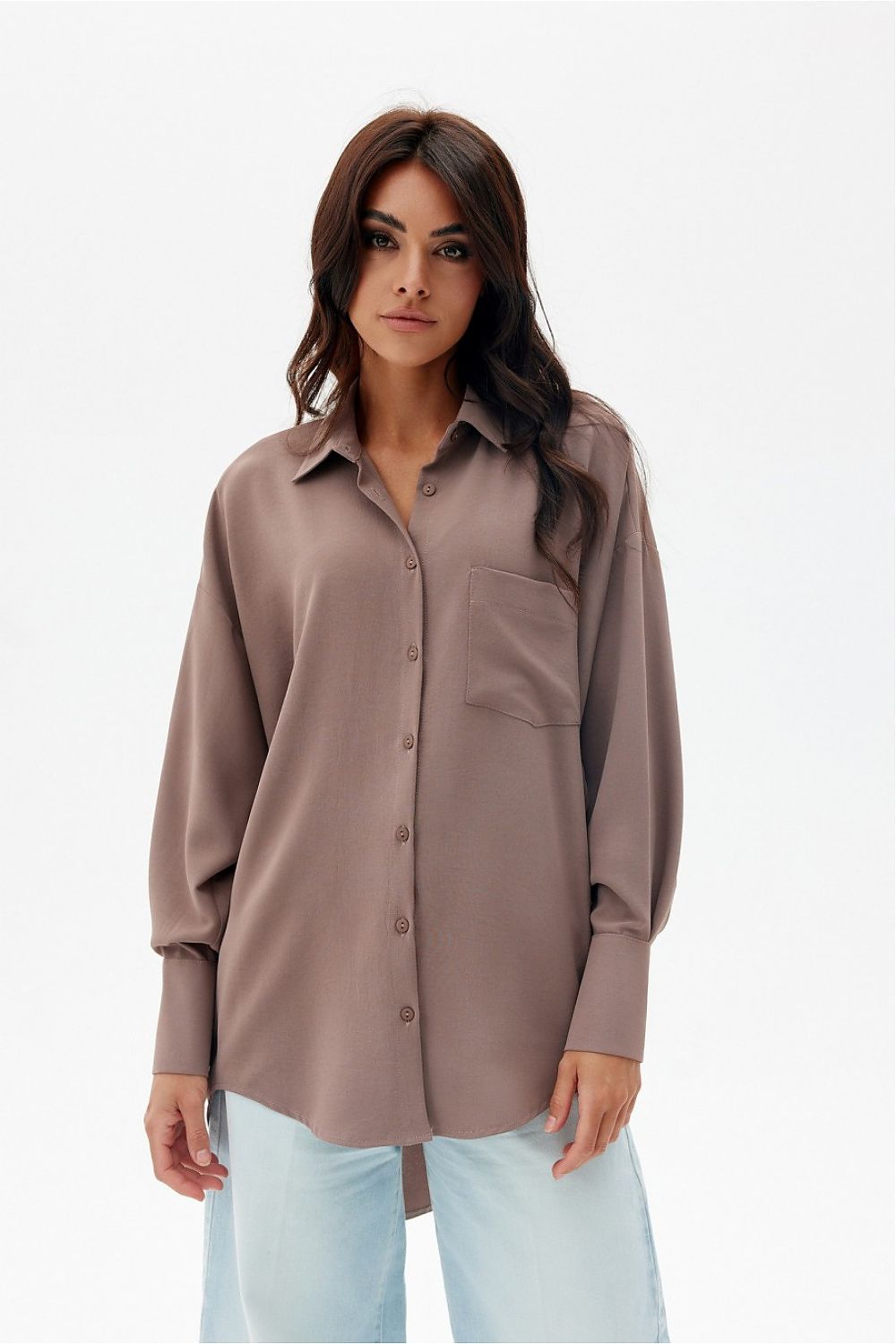 Roco Fashion's stylish long sleeve shirt with a flattering longer back and asymmetrical design, perfect for any elegant occasion.