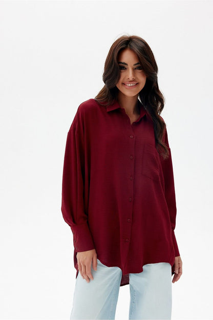Back view of the oversized shirt by Roco Fashion, demonstrating its flattering loose fit and sophisticated longer back.