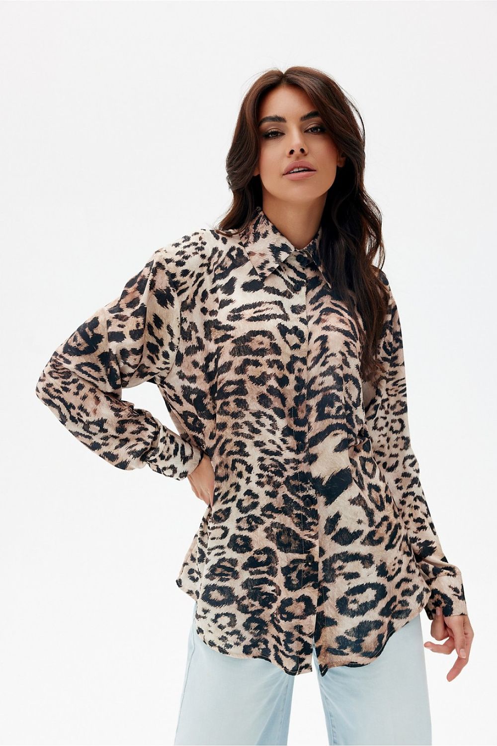 Stylish arrangement of the Leslie Women's Long Sleeve Shirt by Roco Fashion paired with jeans, exemplifying elegant and original wardrobe styling.