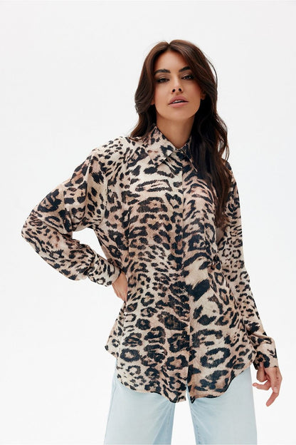 Stylish arrangement of the Leslie Women's Long Sleeve Shirt by Roco Fashion paired with jeans, exemplifying elegant and original wardrobe styling.