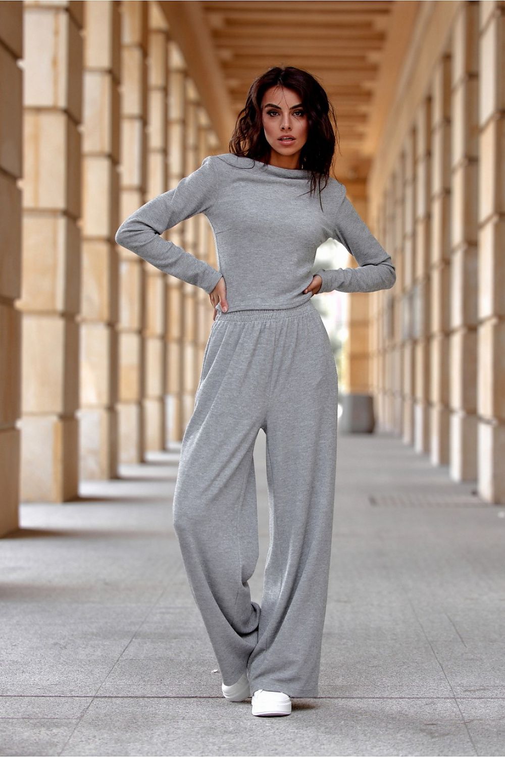 Roco Fashion Women's Wide-Leg Harper Trousers showcasing luxurious melange knit fabric and comfortable elastic waist, elegantly styled for a chic look.