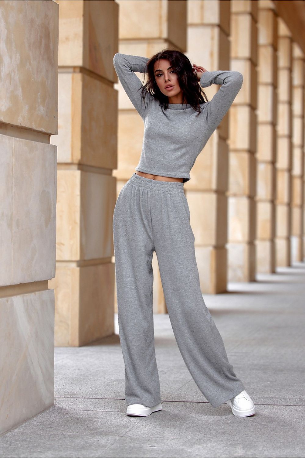 Stylish outfit featuring the Darby Blouse by Roco Fashion, paired with Harper pants, highlighting a fashionable casual look for modern elegance.