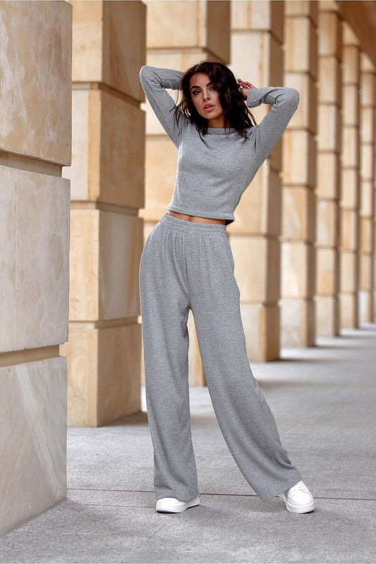 Stylish outfit featuring the Darby Blouse by Roco Fashion, paired with Harper pants, highlighting a fashionable casual look for modern elegance.
