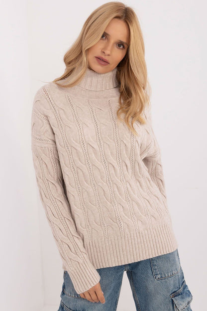 Model wearing the AT Turtleneck Sweater, exuding sophistication and comfort for cooler climates, crafted with durable acrylic and polyester.