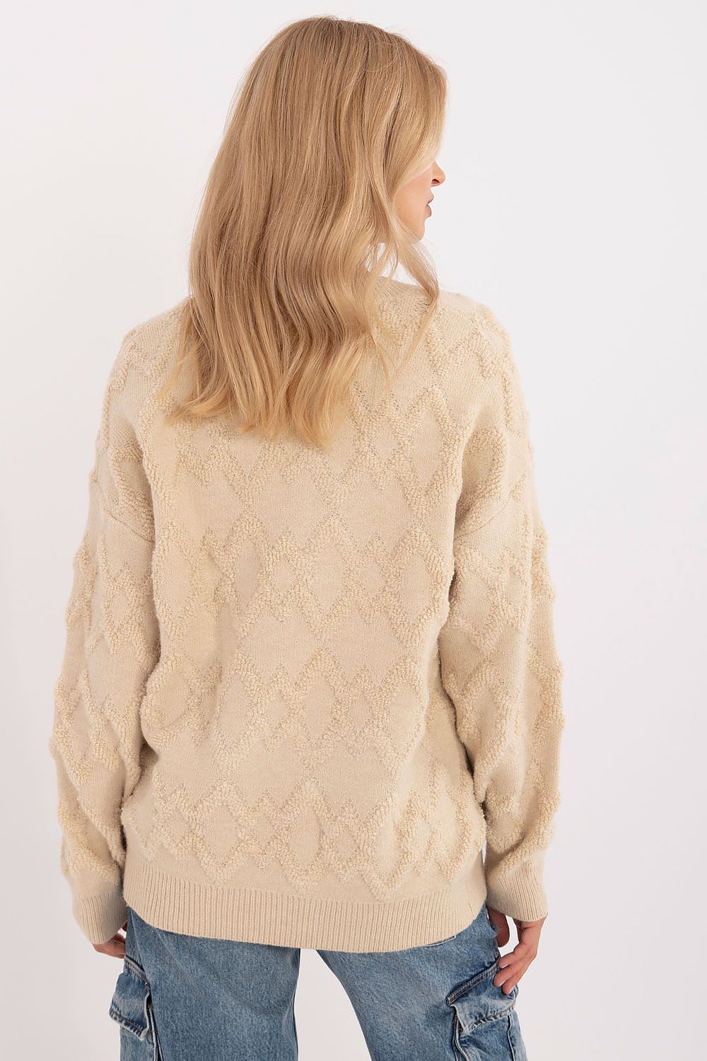 Stylish close-up of AT's women's casual sweater showcasing its intricate woven texture and sophisticated design, ideal for both work and everyday wear.