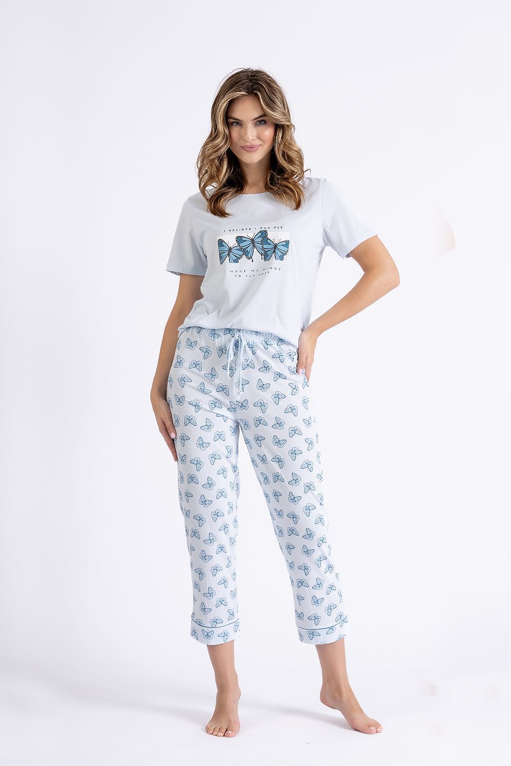 Elegant M-Max Women's Cotton Pyjama Set featuring a comfort-fit short sleeve blouse and stylish 7/8 shorts, designed for luxurious relaxation.