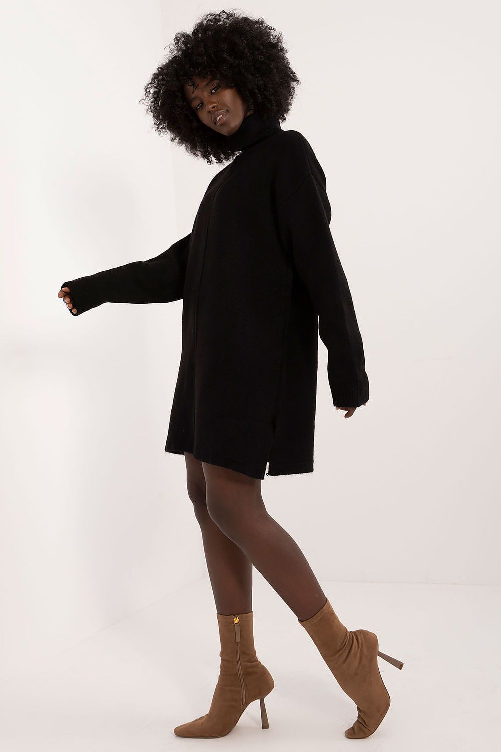 Stunning elegant mini dress by Badu featuring a turtleneck, long sleeves, and crafted from a luxurious soft acrylic blend, ideal for enhancing your urban chic style.
