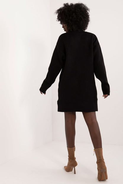 Exquisite detail of Badu's elegant mini dress showcasing its smooth texture, turtleneck design, and comfortable fit, perfect for everyday fashion with a touch of luxury.