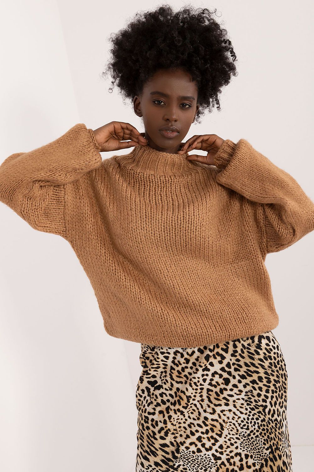 Elegant Comfort Turtleneck Sweater by Badu in soft acrylic, showcasing a luxurious everyday chic style with a smooth texture and warm long sleeves.