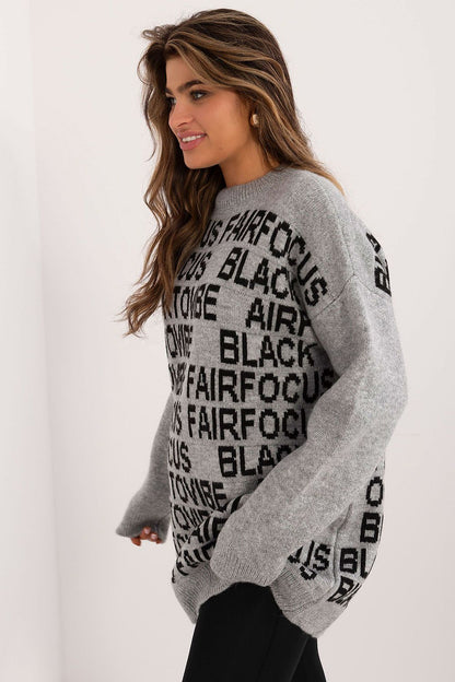 Chic Badu Long Acrylic Sweater in a striking design, ideal for adding a touch of luxury to everyday outfits with its softness and warmth.