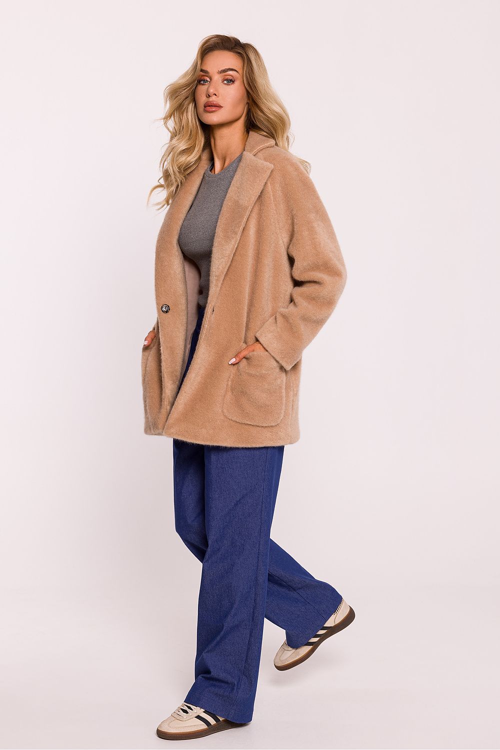 Stylish fully lined teddy bear coat for women designed by Moe, showcasing its plush fabric and chic oversized silhouette for ultimate comfort.