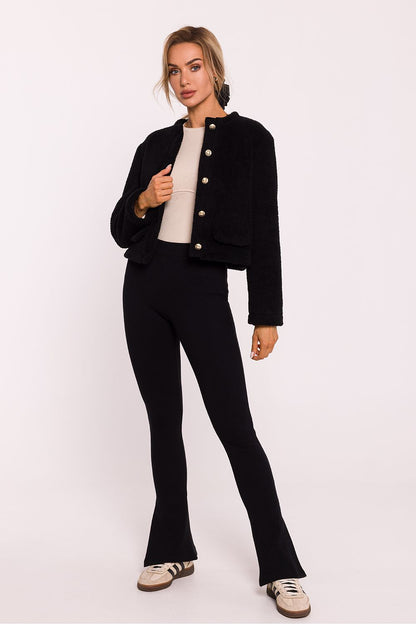 Women's teddy bear fabric sweatshirt by Moe in a chic setting, emphasizing its contemporary style and comfort for everyday elegance.