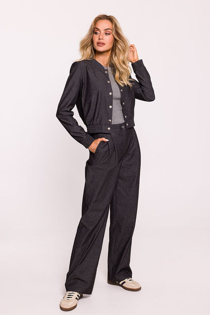 Close-up view of Moe's Women's Bomber Jacket, showcasing the practical snaps and soft cotton fabric, combining elegance with comfort.