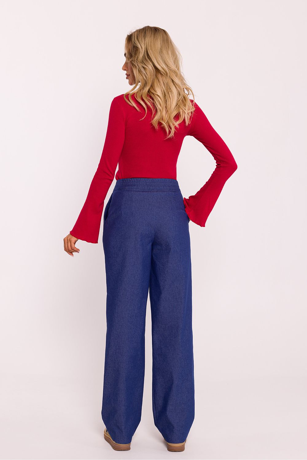 Luxurious women's trousers from Moe, designed with a comfortable elastic waistband, wide legs, and chic dart detailing, perfect for any elegant occasion.